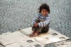 unknown-homeless-kid-sitting-street-tirana-albania-may-old-box-tirana-43944722-300x200